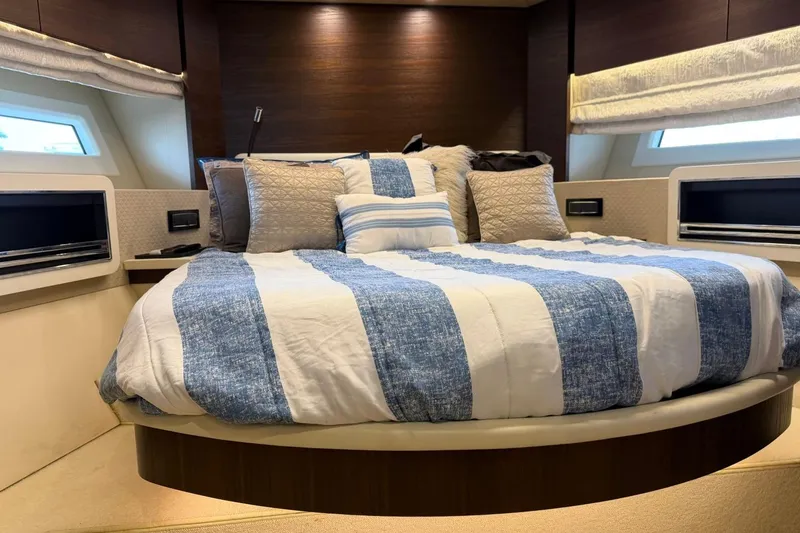 Slide: The Image of Luxurious bedroom interior of 2017 Azimut Fly 72 yacht with elegant bedding and modern design. - 51