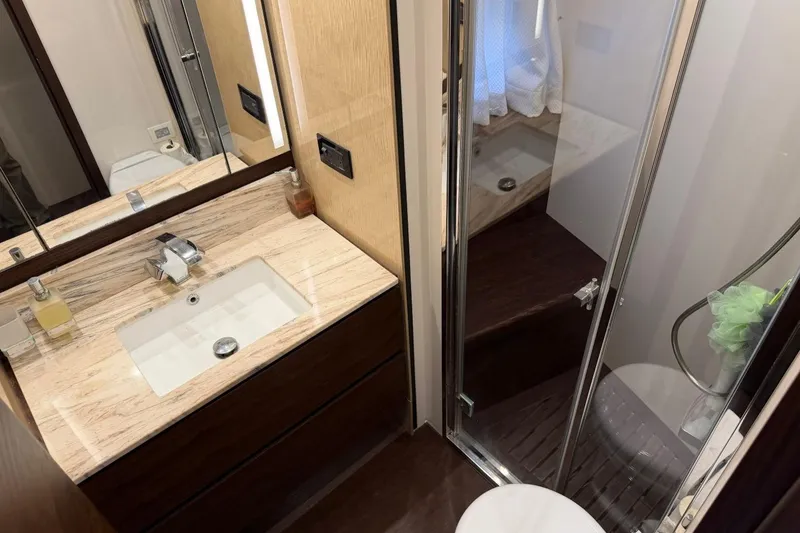 Slide: The Image of Luxurious bathroom in 2017 Azimut Fly 72 yacht with modern fixtures and shower. - 52