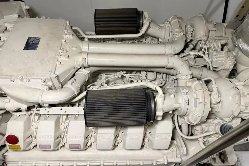 Slide: The Image of Engine of a 2017 Azimut Fly 72 yacht, showcasing intricate mechanical components. - 55