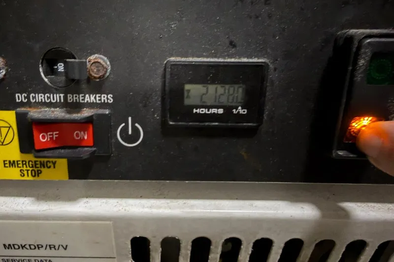 Slide: The Image of Control panel of a 2017 Azimut Fly 72 yacht, showing circuit breakers and hour meter. - 69
