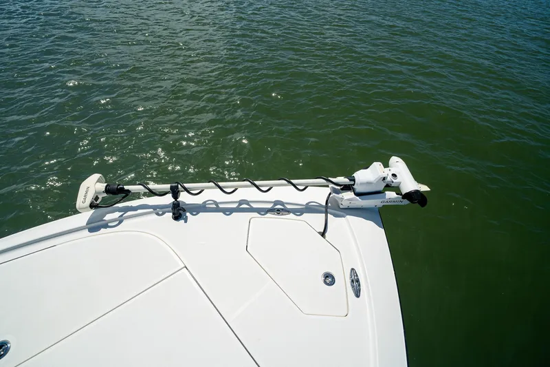 Slide: The Image of Bow of 2018 SeaVee 270Z with Garmin trolling motor on calm water. - 14