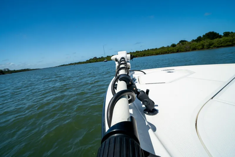 Slide: The Image of 2018 SeaVee 270Z boat on calm water under clear blue sky. - 15