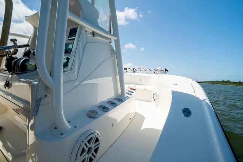 Slide: The Image of 2018 SeaVee 270Z boat on water, showcasing sleek design and modern features. - 24
