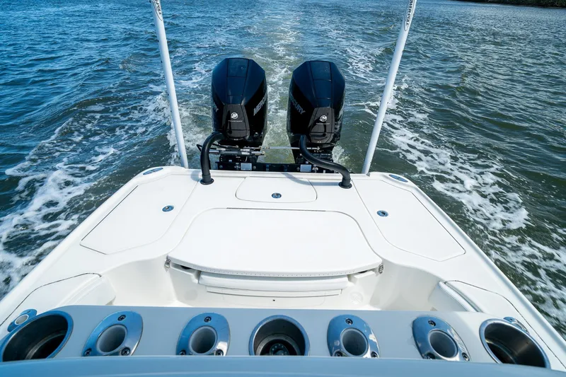 Slide: The Image of 2018 SeaVee 270Z boat with dual outboard motors cruising on open water. - 37
