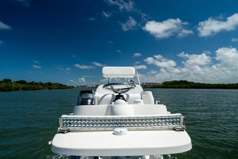 Slide: The Image of 2018 SeaVee 270Z boat cruising on a sunny day with clear skies. - 47