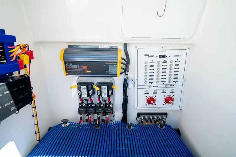 Slide: The Image of Electrical panel of a 2018 SeaVee 270Z boat with ProSport20 plus charger. - 56