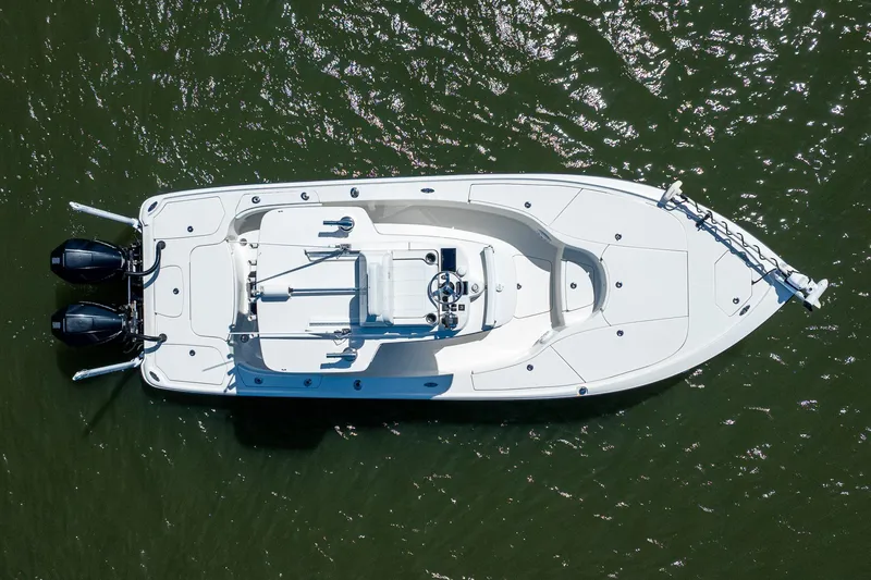 Slide: The Image of Overhead view of 2018 SeaVee 270Z boat on water with dual engines. - 65