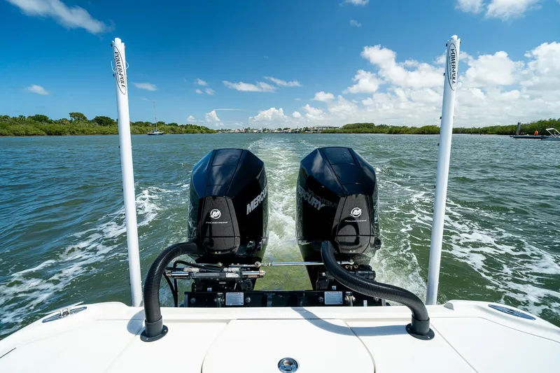 Slide: The Image of 2018 SeaVee 270Z boat with dual Mercury engines cruising on open water. - 67
