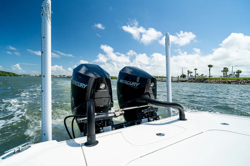 Slide: The Image of 2018 SeaVee 270Z boat with dual Mercury engines on open water. - 68