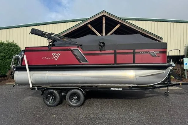 The Image of 2022 Viaggio Lago 18F pontoon boat on trailer, parked outdoors. - 0