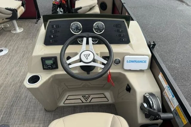 Slide: The Image of Steering console of 2022 Viaggio Lago 18F boat with Lowrance navigation system. - 10
