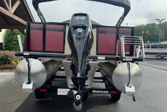 Slide: The Image of 2022 Viaggio Lago 18F pontoon boat with outboard motor, parked on a trailer. - 4