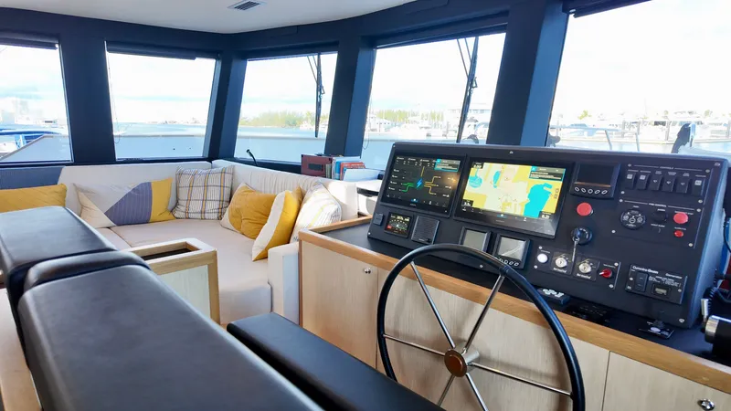 Slide: The Image of Interior of 2024 LEEN-TRIMARANS 72 with helm and seating area. - 13