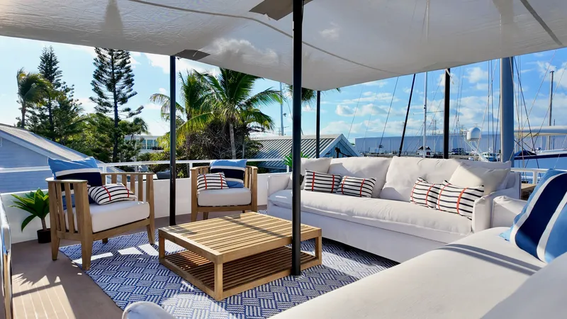 Slide: The Image of Luxurious outdoor seating on 2024 LEEN-TRIMARANS 72 with stylish furniture. - 2