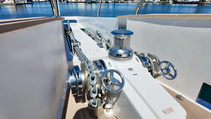 Slide: The Image of Anchor winch on LEEN-TRIMARANS 72, 2024 model, docked at harbor. - 39