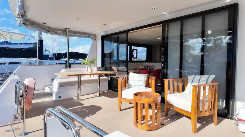 Slide: The Image of LEEN-TRIMARANS 72 Yacht 2024 with stylish outdoor deck and seating area. - 9