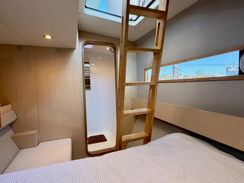Slide: The Image of Interior of LEEN-TRIMARANS 72, 2024, featuring wooden ladder and bed. - 32