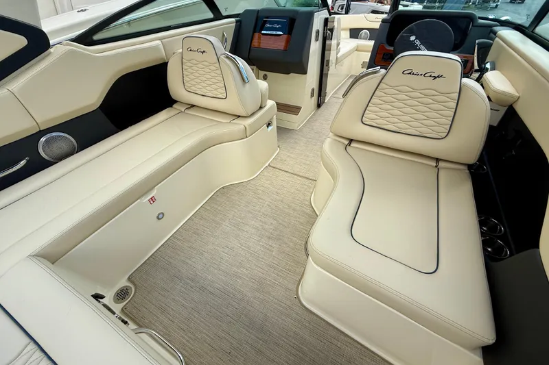 Slide: The Image of Luxurious interior of 2026 Chris-Craft Sportster 28 with cream leather seating and elegant design. - 6