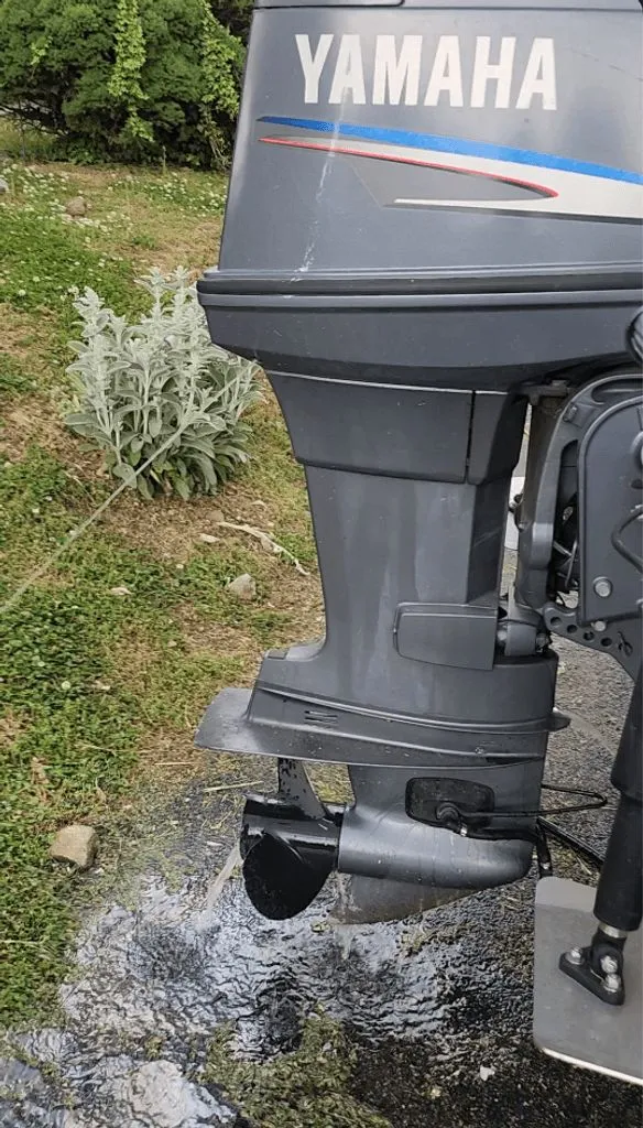 Slide: The Image of Yamaha outboard motor on a 2005 Angler 173 CC boat. - 8