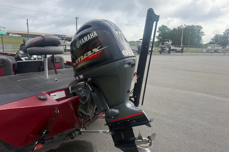 Slide: The Image of 2019 Ranger RT188 boat with Yamaha outboard motor in a parking lot. - 9