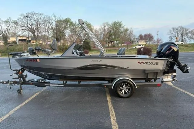 The Image of 2023 Vexus ADX 190 boat on trailer in parking lot, side view. - 0