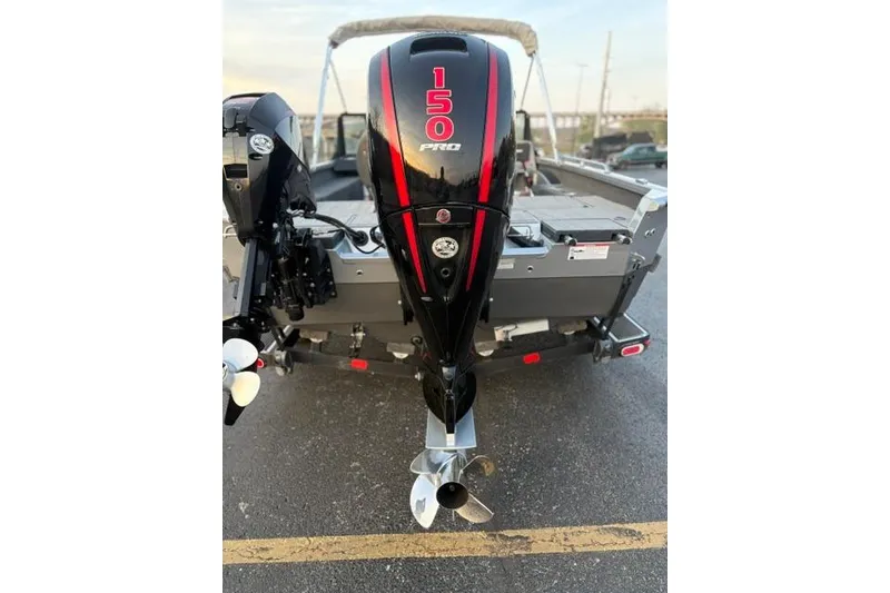 Slide: The Image of 2023 Vexus ADX 190 boat with a 150 Pro outboard motor, rear view. - 11