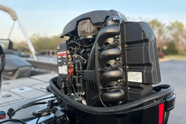 Slide: The Image of 2023 Vexus ADX 190 boat engine, detailed view of components and wiring. - 14