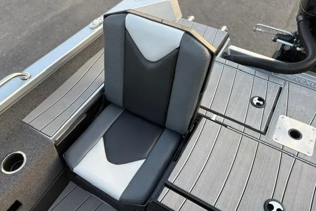 Slide: The Image of 2023 Vexus ADX 190 boat seat with sleek gray and black design. - 28