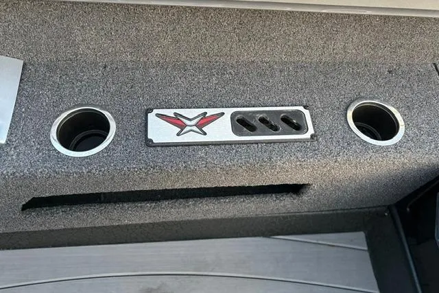 Slide: The Image of 2023 Vexus ADX 190 boat console with cup holders and control panel. - 30