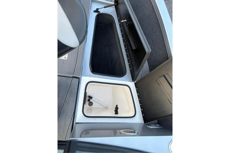 Slide: The Image of 2023 Vexus ADX 190 boat storage compartments, open and ready for use. - 38