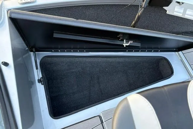 Slide: The Image of Open storage compartment in 2023 Vexus ADX 190 boat, showcasing interior space. - 39