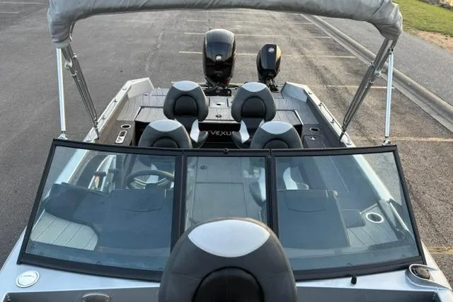 Slide: The Image of 2023 Vexus ADX 190 boat interior with seating and dual motors. - 41
