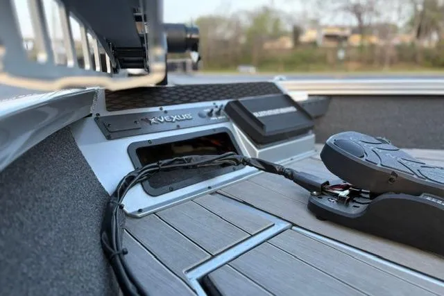 Slide: The Image of 2023 Vexus ADX 190 boat interior with advanced control panel and sleek design. - 48