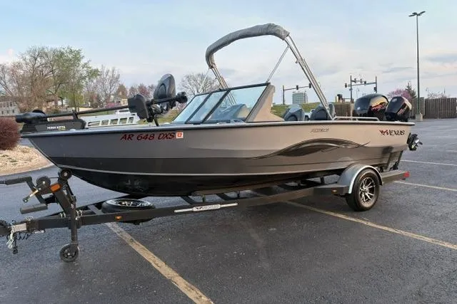 Slide: The Image of 2023 Vexus ADX 190 boat on trailer in parking lot, side view. - 5