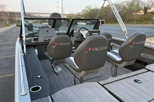 Slide: The Image of 2023 Vexus ADX 190 boat interior with sleek seating and modern dashboard design. - 50
