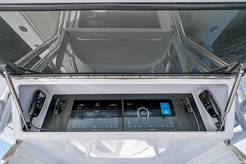 Slide: The Image of Control panel of 2022 Bahama 41 boat with advanced Garmin navigation system. - 11