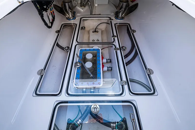 Slide: The Image of Engine compartment of 2022 Bahama 41 boat with visible components and wiring. - 25