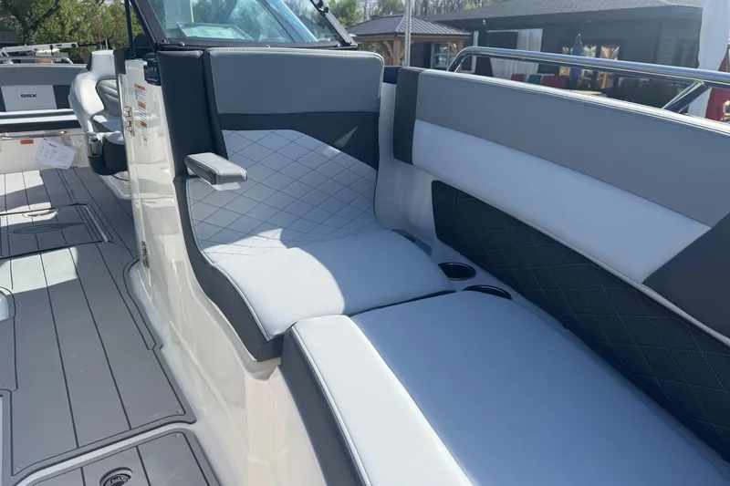 Slide: The Image of 2026 Chaparral SSX 30 boat interior with sleek, modern seating and elegant design. - 11