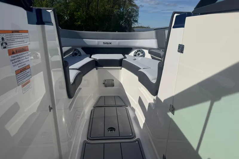 Slide: The Image of 2026 Chaparral SSX 30 boat interior with seating and speaker system. - 13