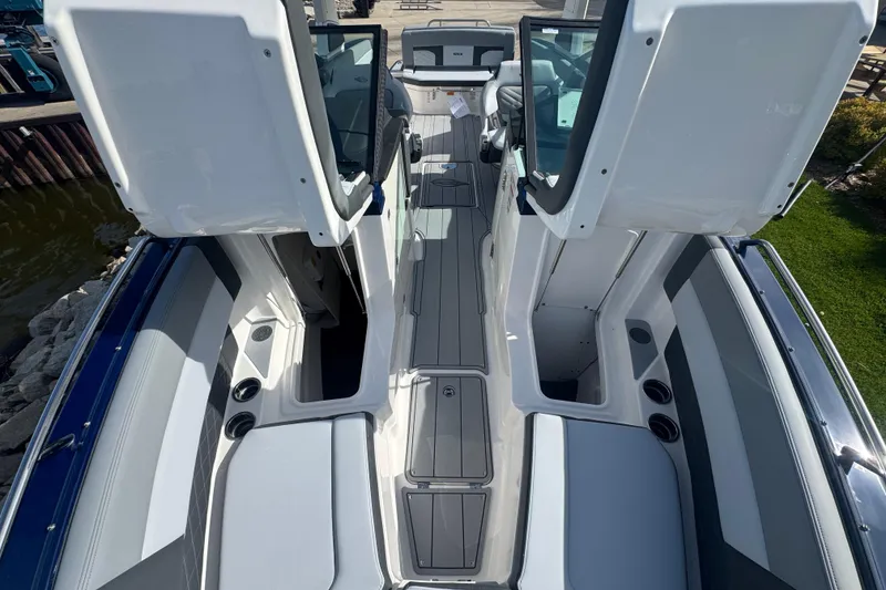 Slide: The Image of 2026 Chaparral SSX 30 boat interior with sleek seating and modern design features. - 14
