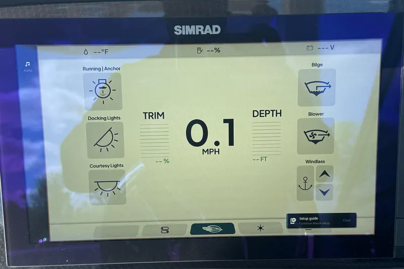 Slide: The Image of Simrad display on 2026 Chaparral SSX 30 showing speed, trim, and depth. - 19