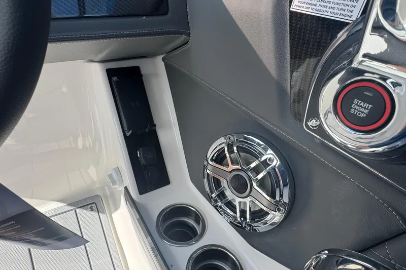 Slide: The Image of Interior of 2026 Chaparral SSX 30 boat with start button and speaker. - 24