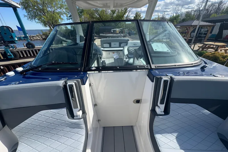 Slide: The Image of 2026 Chaparral SSX 30 boat interior with sleek seating and modern design. - 26