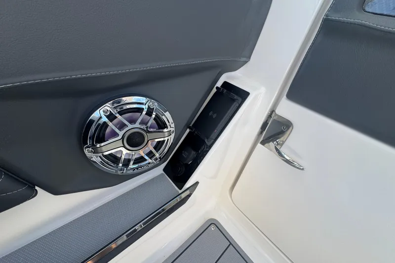 Slide: The Image of 2026 Chaparral SSX 30 boat interior with speaker and charging port detail. - 35