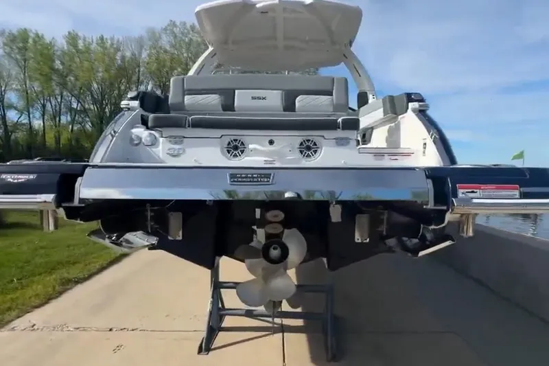 Slide: The Image of 2026 Chaparral SSX 30 boat rear view, showcasing sleek design and powerful engine. - 6