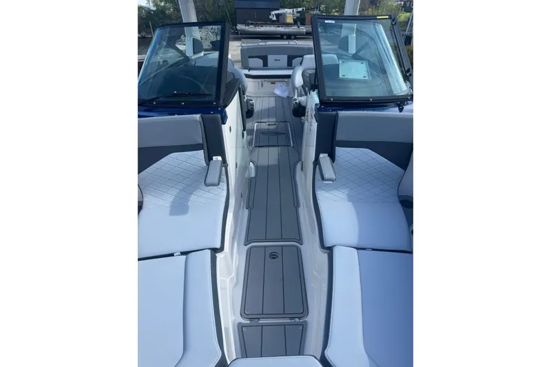 Slide: The Image of 2026 Chaparral SSX 30 boat interior with sleek seating and modern design. - 8