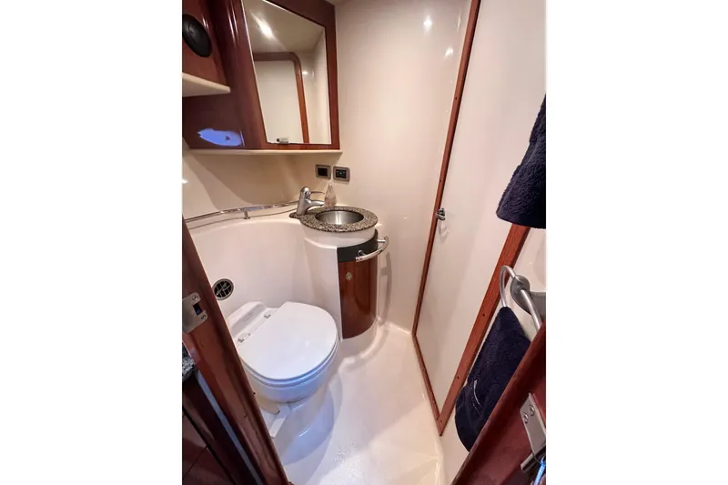 Slide: The Image of Luxurious bathroom in 2005 Sea Ray 390 Sundancer yacht with modern fixtures. - 13