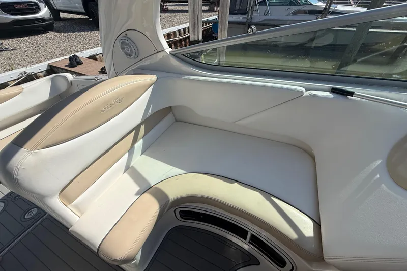 Slide: The Image of 2009 Sea Ray Sundancer 280 boat interior with beige and white seating. - 4