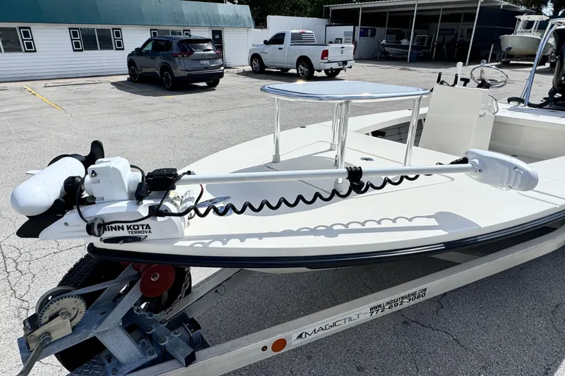 Slide: The Image of 2022 Maverick 18 HPX-V boat with Minn Kota Terrova motor on trailer. - 15