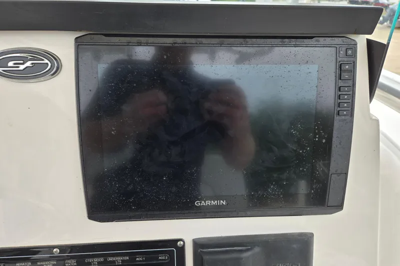 Slide: The Image of Garmin display on 2023 Sea Fox 228 Commander boat dashboard, featuring control panel. - 17